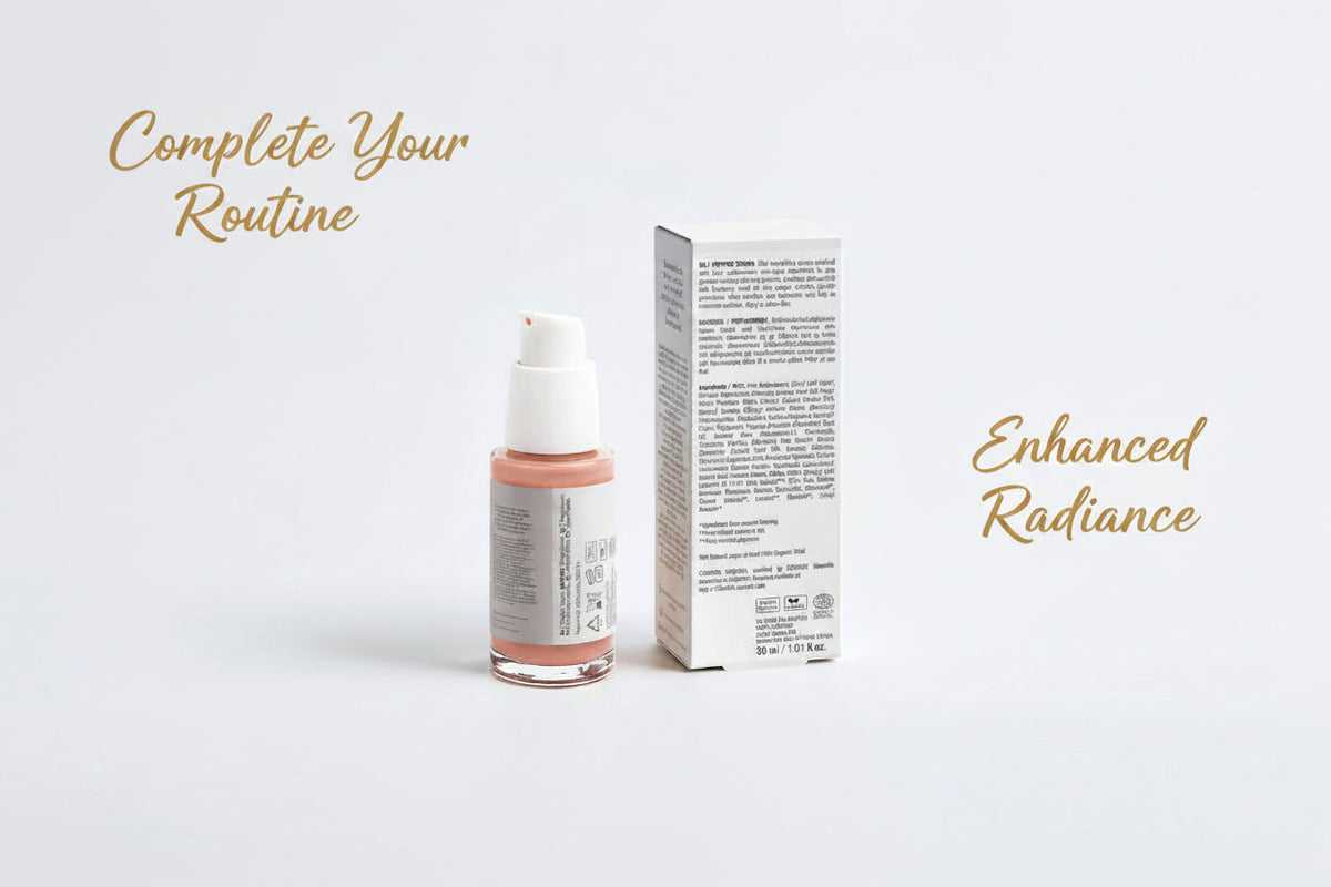 A bottle of liquid makeup with a white pump and a matching white product box, photographed on a clean light gray studio background.