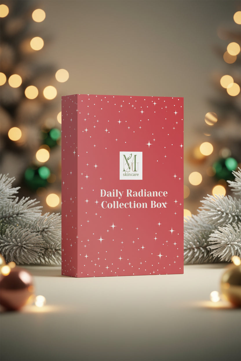 A tall rectangular red box with white star-like speckles and the text 'Daily Radiance Collection Box' on the front, plus a small 'M' logo, shown on a clean light gray studio background.